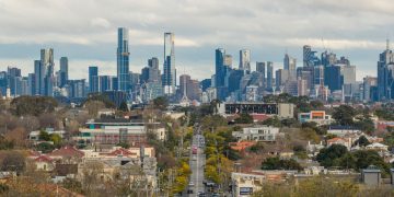 A view of Melbourne's skyline as seen from Hawthorn, showcasing prominent skyscrapers and urban landscape.