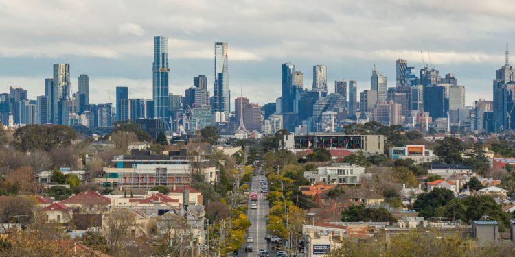 A view of Melbourne's skyline as seen from Hawthorn, showcasing prominent skyscrapers and urban landscape.
