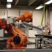 Industrial robotic arm in a Ciudad de México lab setting, showcasing automation technology.
