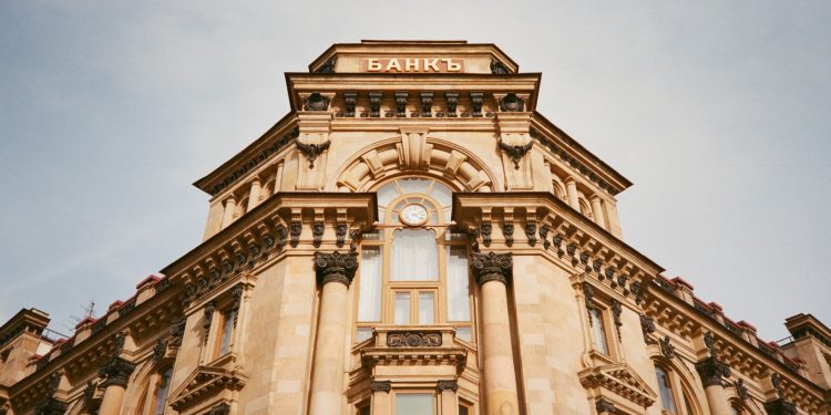 Ornate bank facade in Moscow featuring columns, windows, and architectural details.