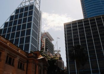 Impressive skyscrapers in Sydney's business district on a sunny day.
