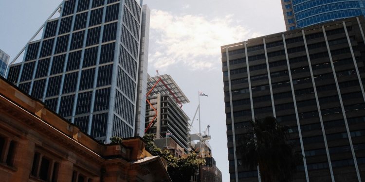 Impressive skyscrapers in Sydney's business district on a sunny day.