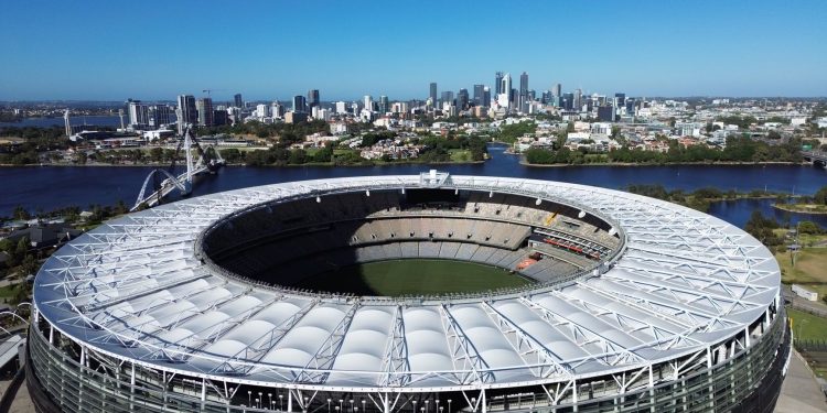 Stunning aerial view of Optus Stadium in Perth, Western Australia with city skyline backdrop.