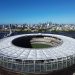 Stunning aerial view of Optus Stadium in Perth, Western Australia with city skyline backdrop.