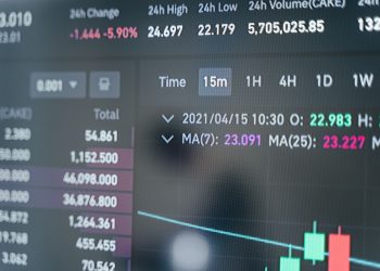 Close-up of a cryptocurrency trading screen displaying real-time data, graphs, and analytics.