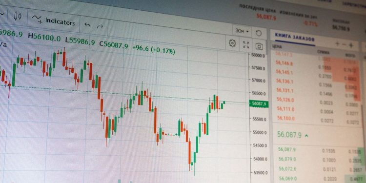 Close-up of digital cryptocurrency market graph showing price fluctuations and trading data.