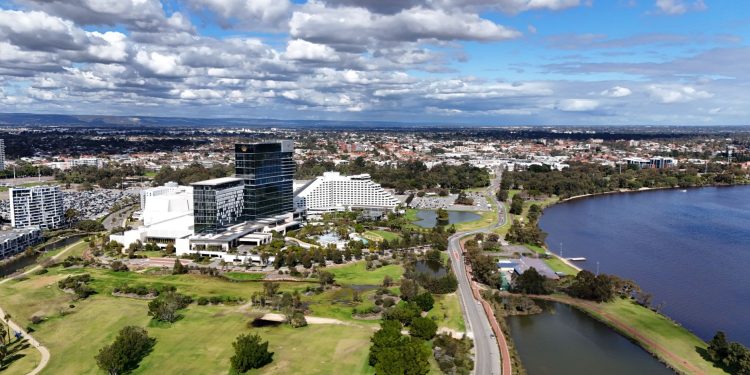 Aerial view capturing Burswood in WA, Australia featuring urban landscape and the scenic Swan River.
