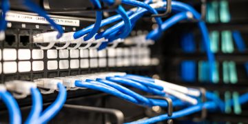 Blue plastic wires with white tips connected to server and provide access to information