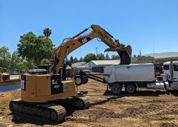 Caterpillar 325 FL excavator on a job site.jpg