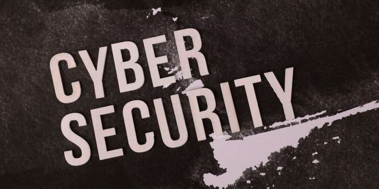 Cyber security concept shown on grunge-style background highlights the importance of digital protection.
