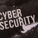 Cyber security concept shown on grunge-style background highlights the importance of digital protection.