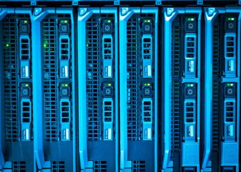 Detailed image of illuminated server racks showcasing modern technology infrastructure.