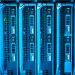 Detailed image of illuminated server racks showcasing modern technology infrastructure.